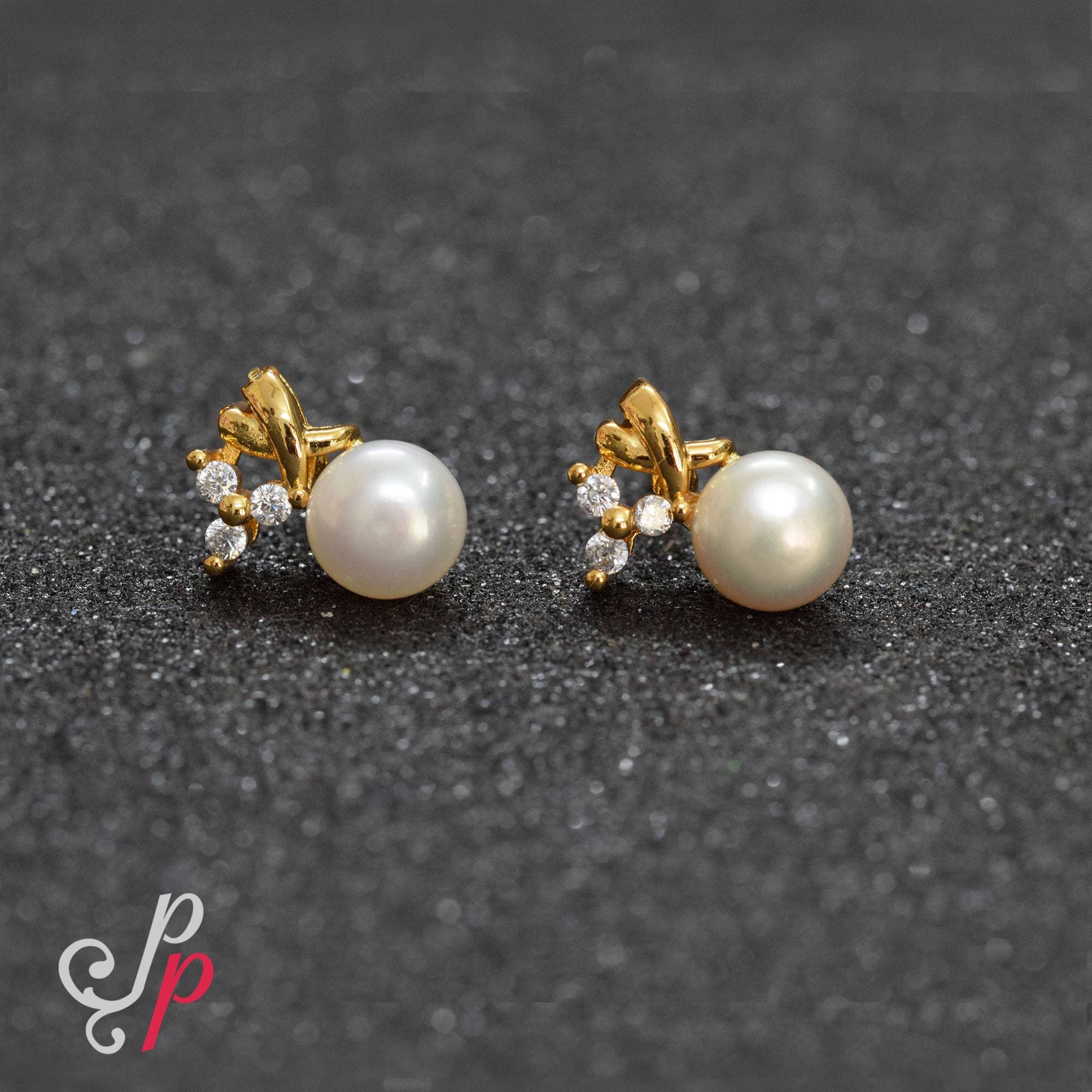 Fashionable Pearl Studs in American Diamonds