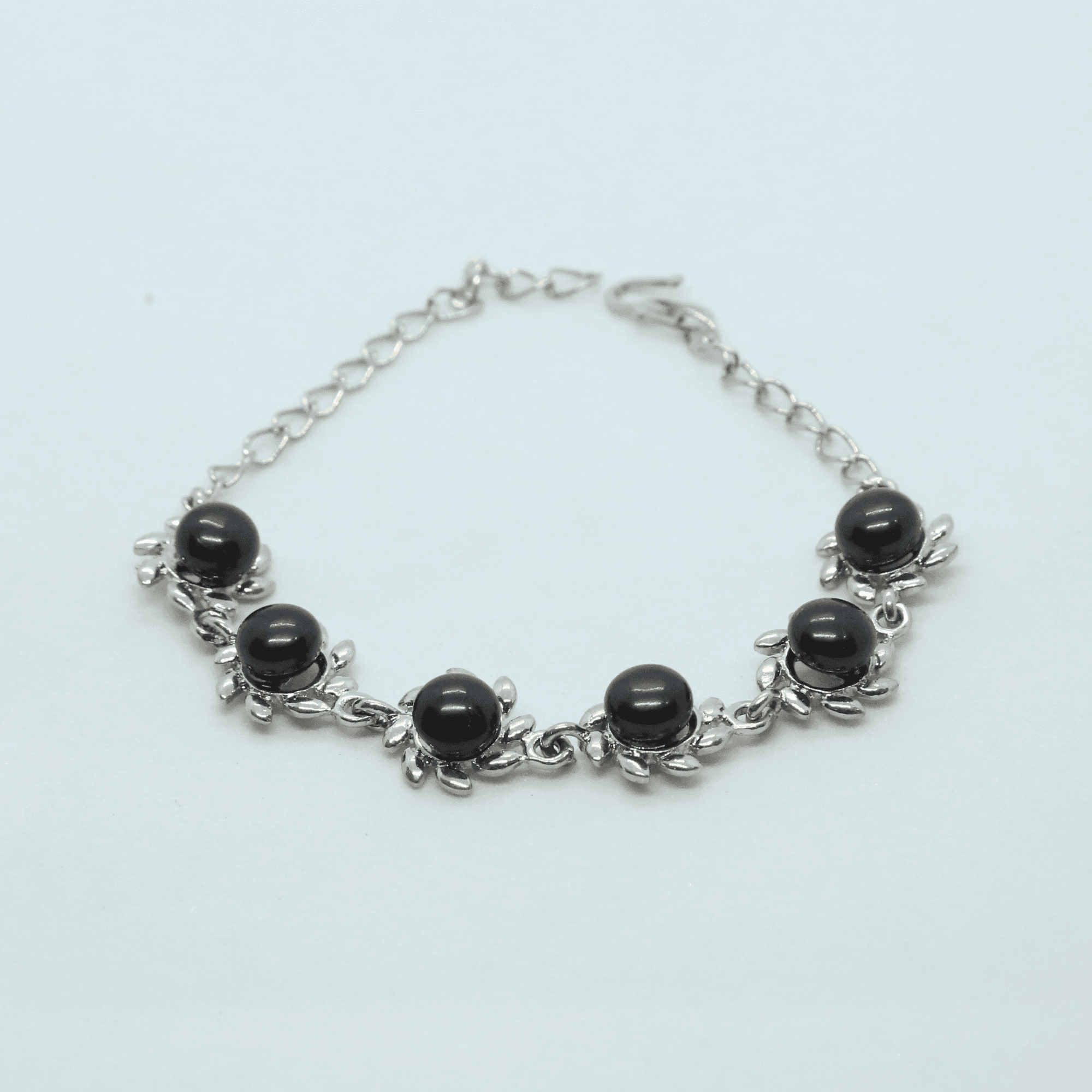 Floral Blue Button Pearls Bracelet In Silver Finish
