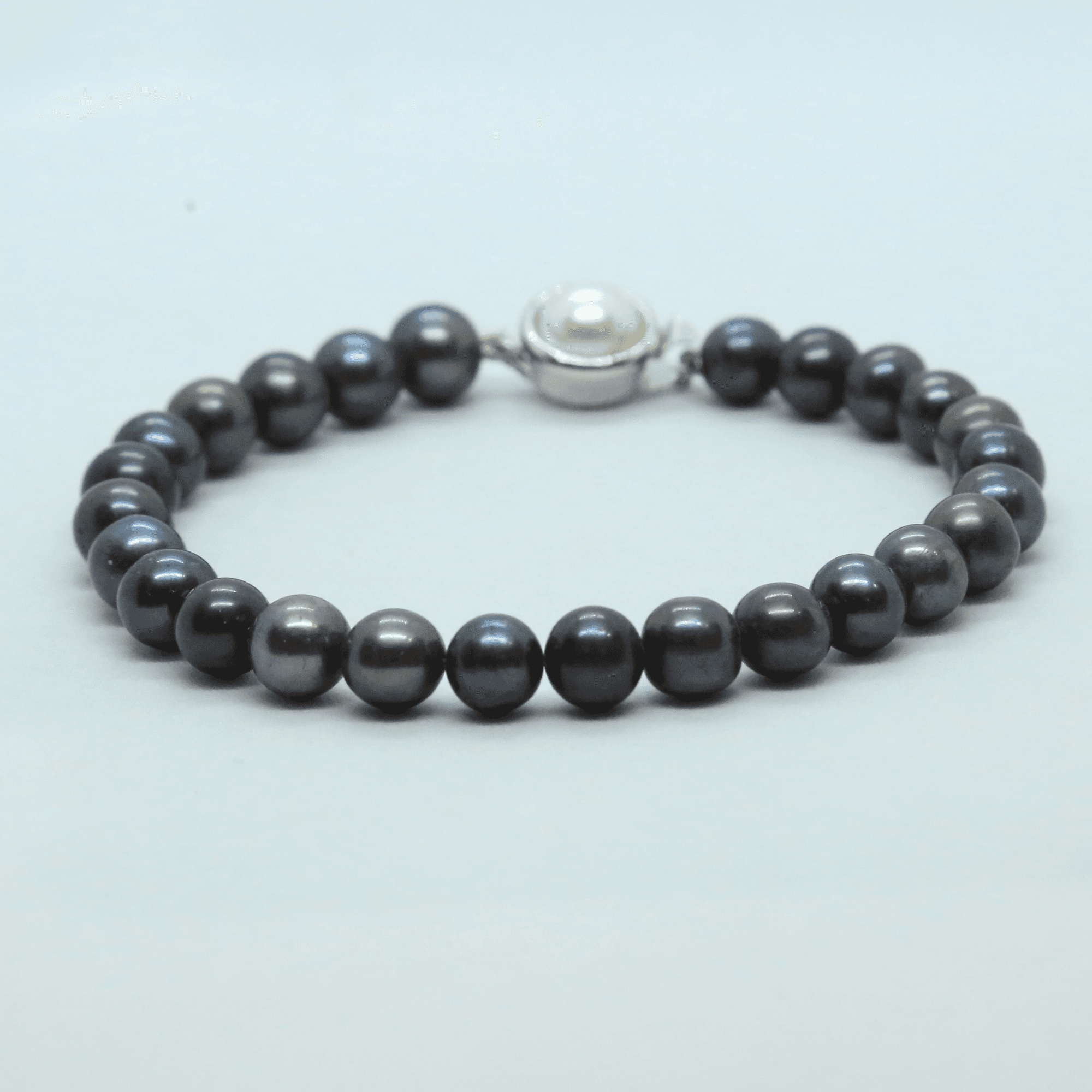 Glorious Multi-shaded 7.5mm Round Pearls Bracelet