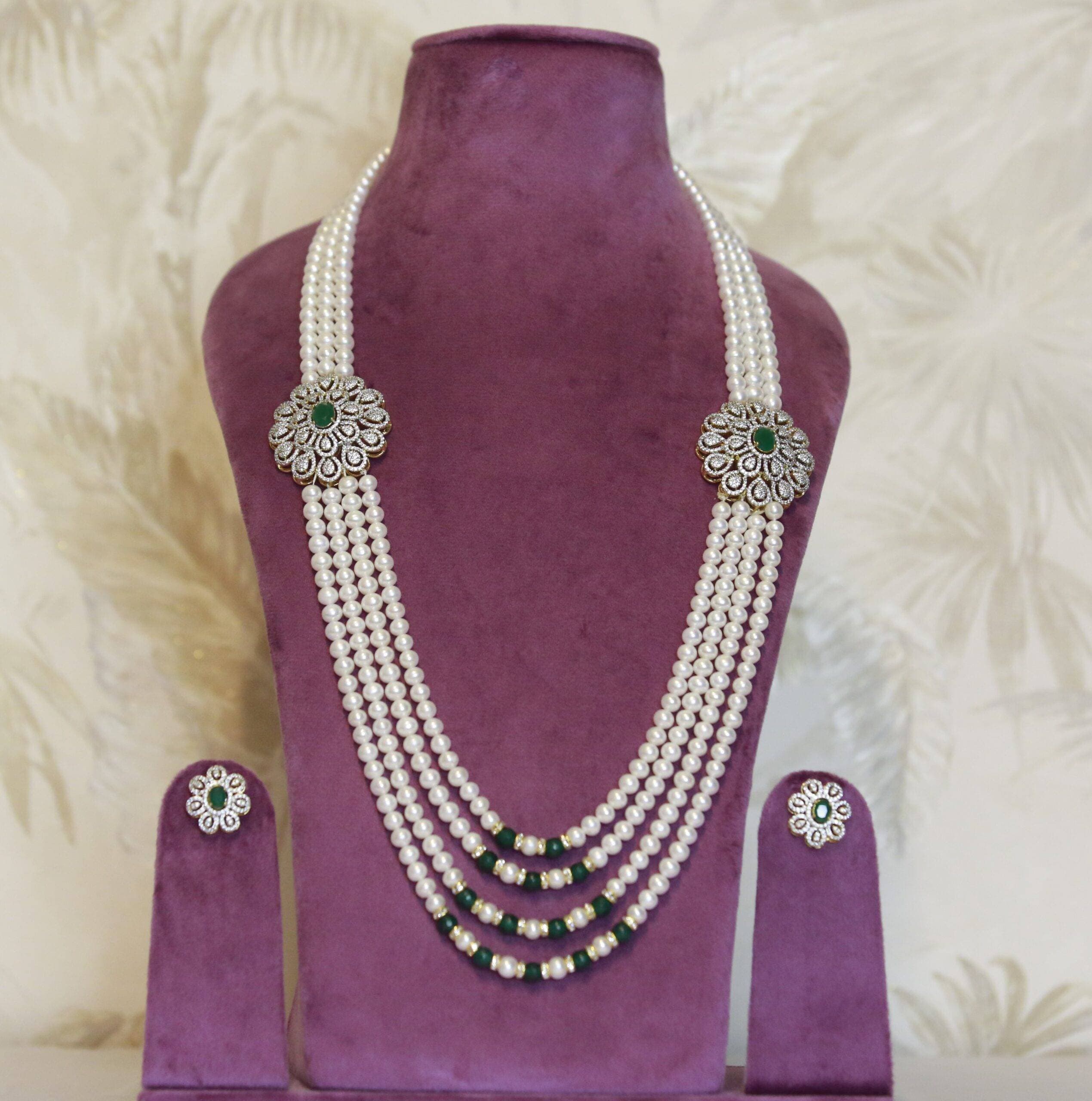 Resplendant White Round Pearls Haar With CZ & SP Emerald Side Pendants