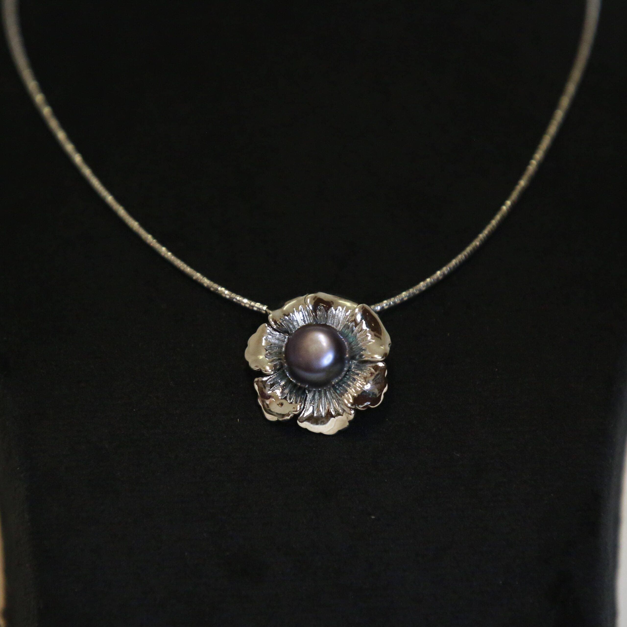 Bold Silver Finish Floral Pendant With 12mm Blue Button Pearl