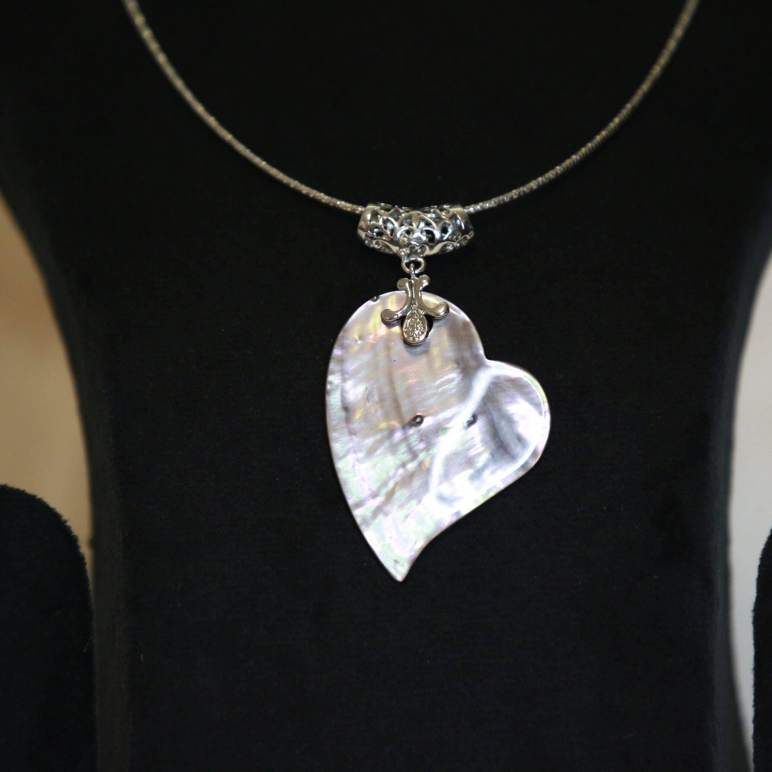 Unique Abalone Mother of Pearl Heart Shaped Pendant With A Filigree Clasp