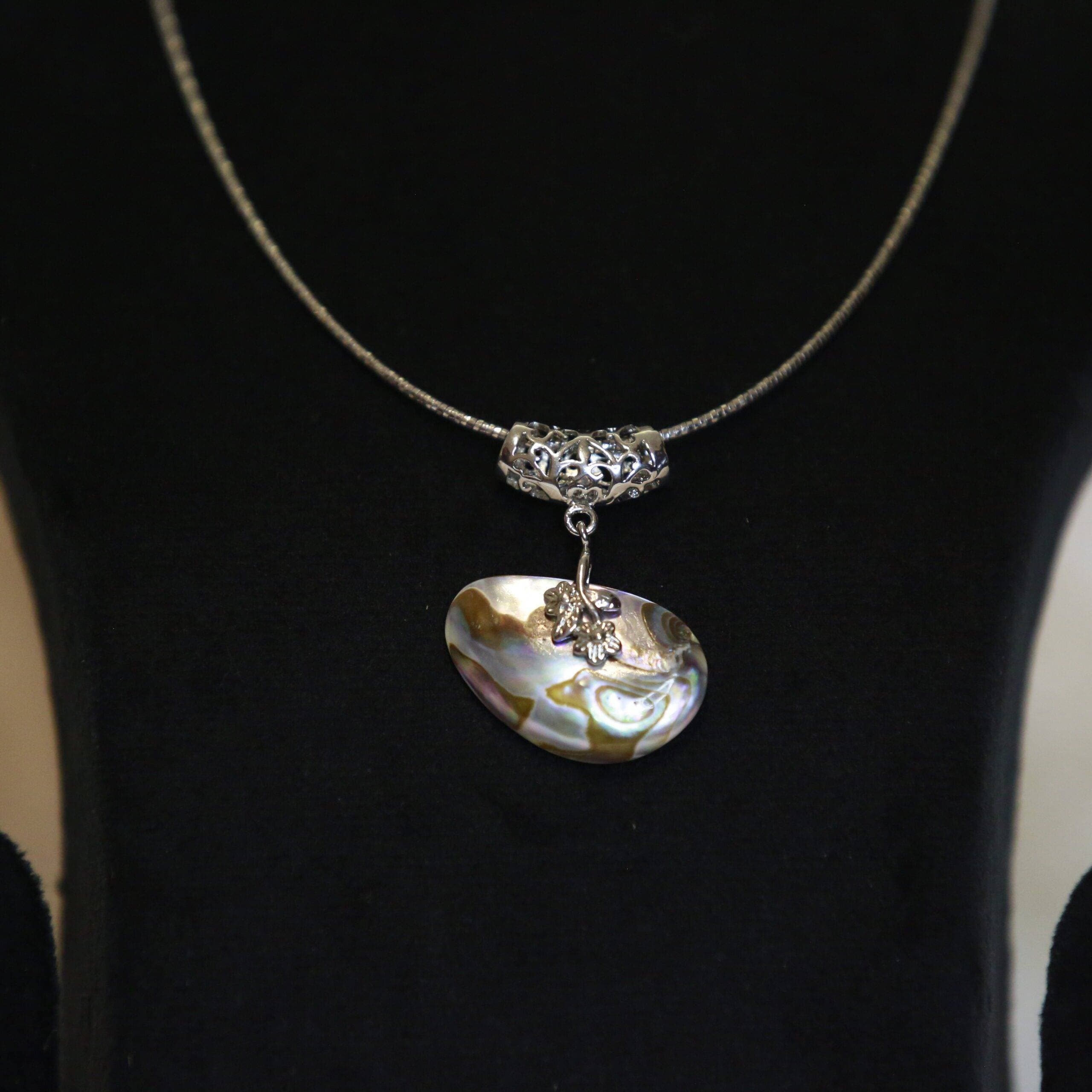 Unique Abalone Mother of Pearl Pendant With A Filigree Clasp