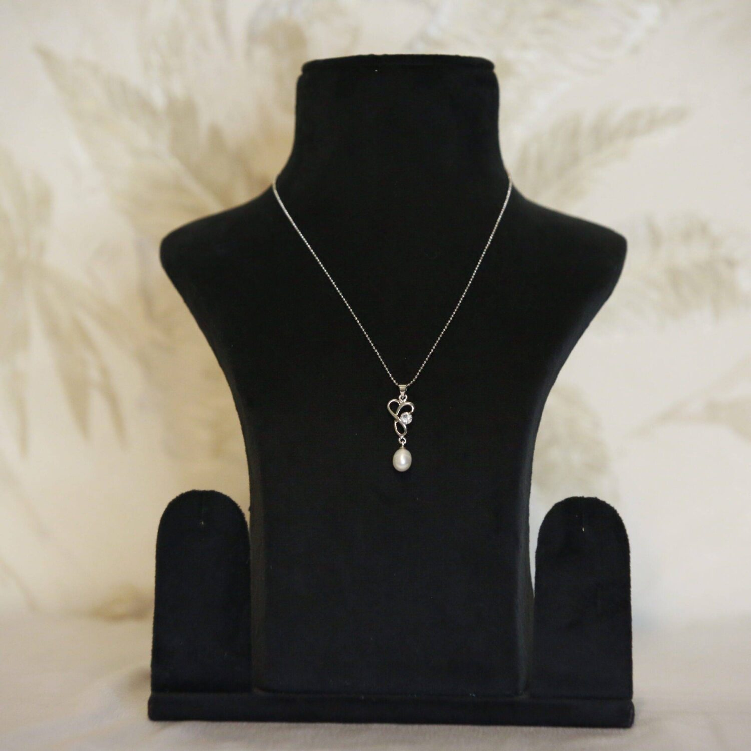 Twirled Knot Pendant Accentuated With 7mm Oval White Pearl & CZ - Image 2
