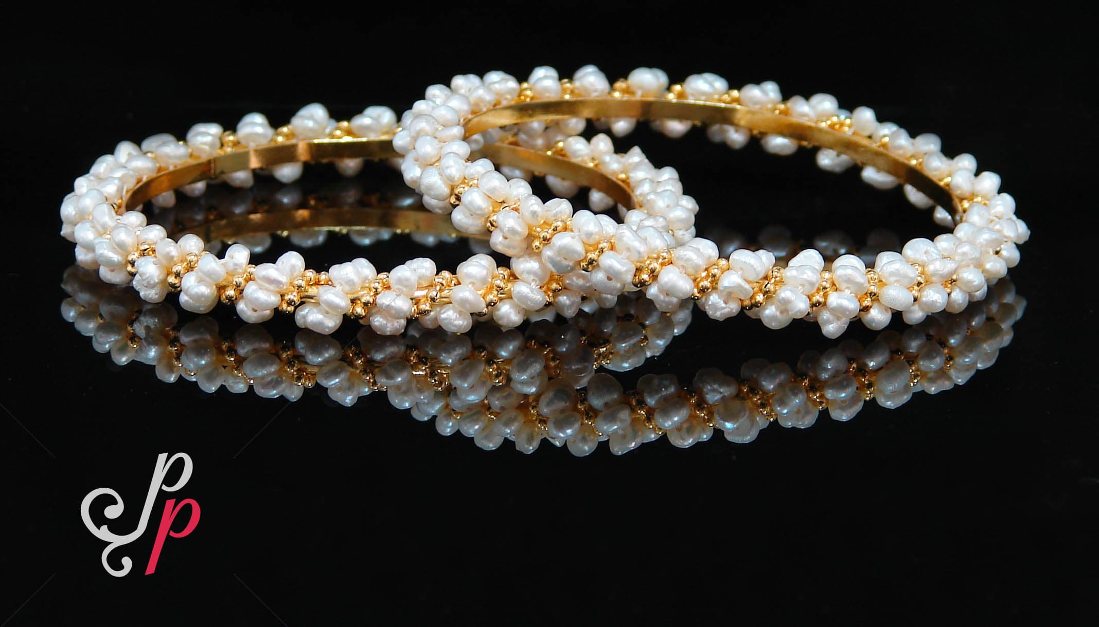 Cute pearl bangles strung with golden beads