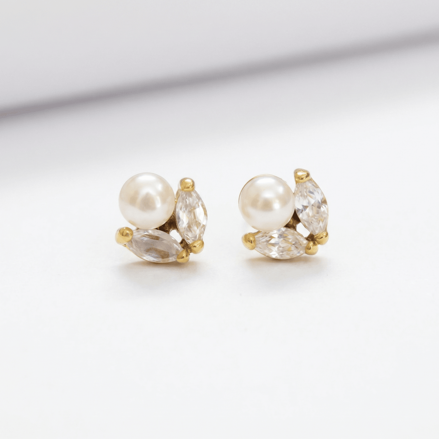 Cute Pearl Studs in leaf like Zircon Stones