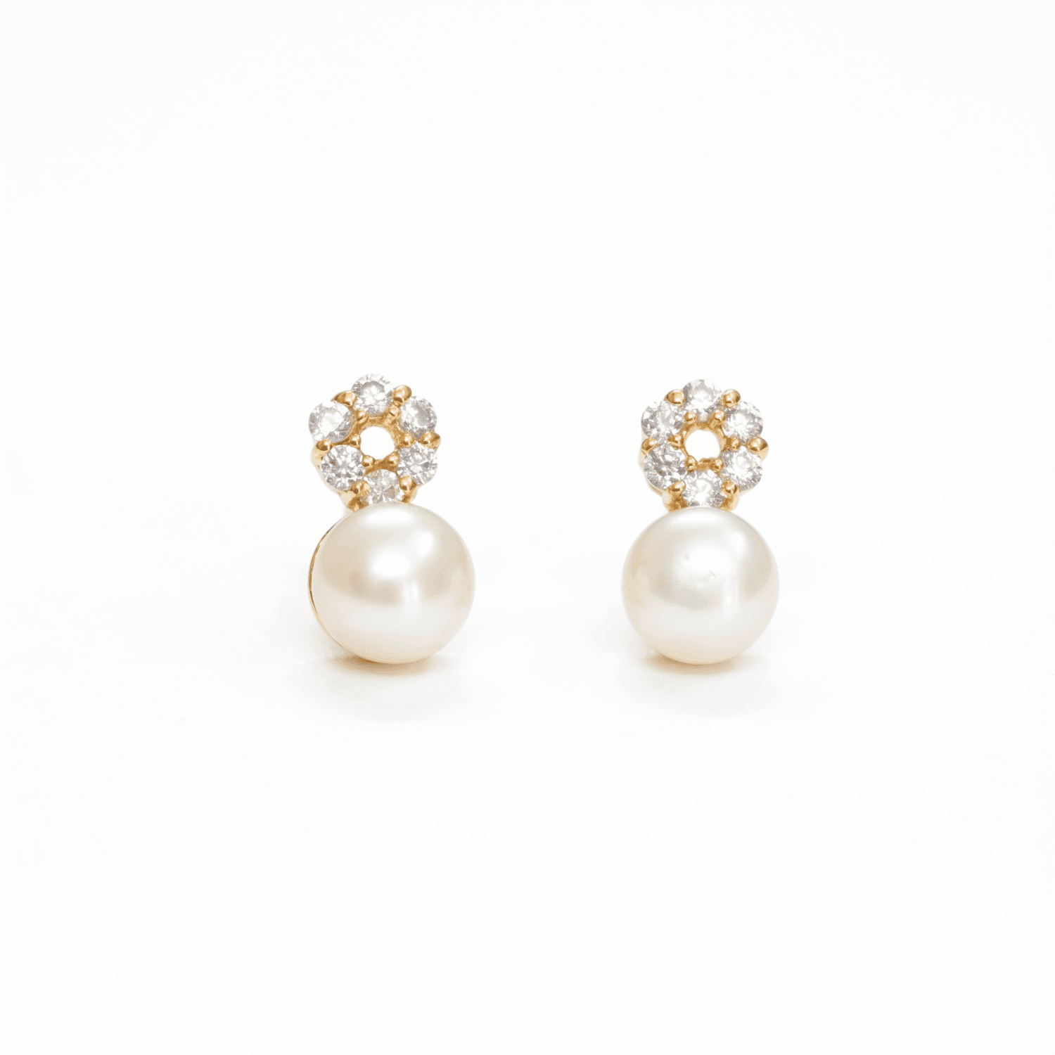 Stylish Pearl Studs in American Diamonds