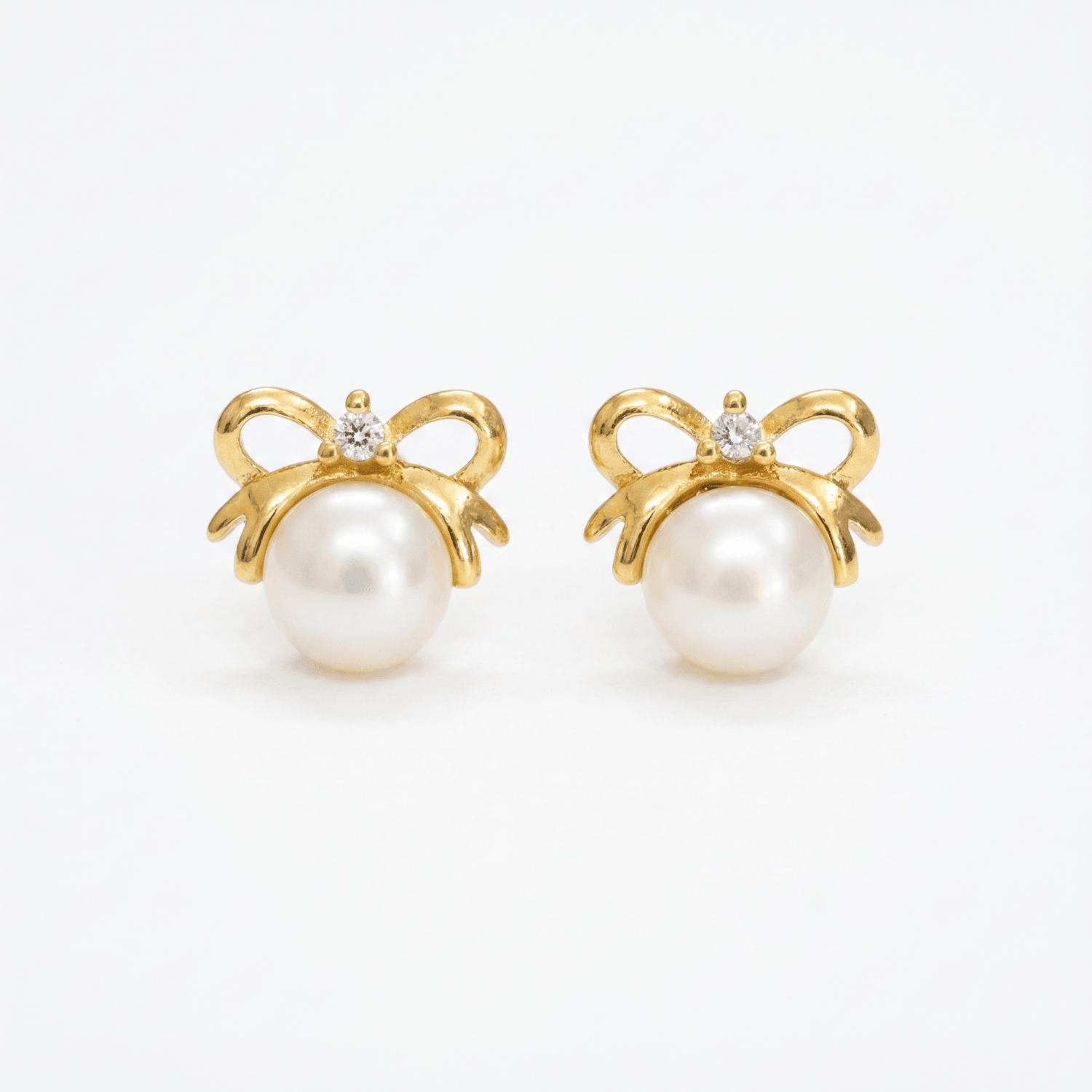 Pretty Butterfly Pearl Studs in Golden Colour Korean Metal