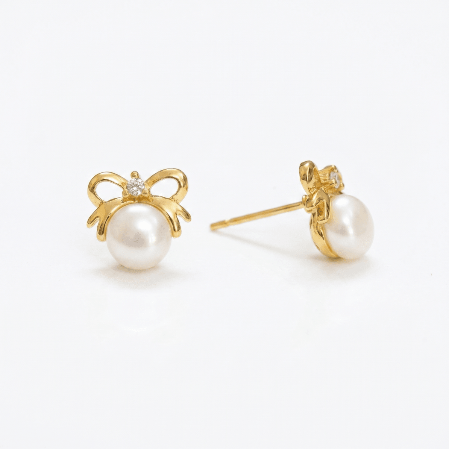 Pretty Butterfly Pearl Studs in Golden Colour Korean Metal - Image 2