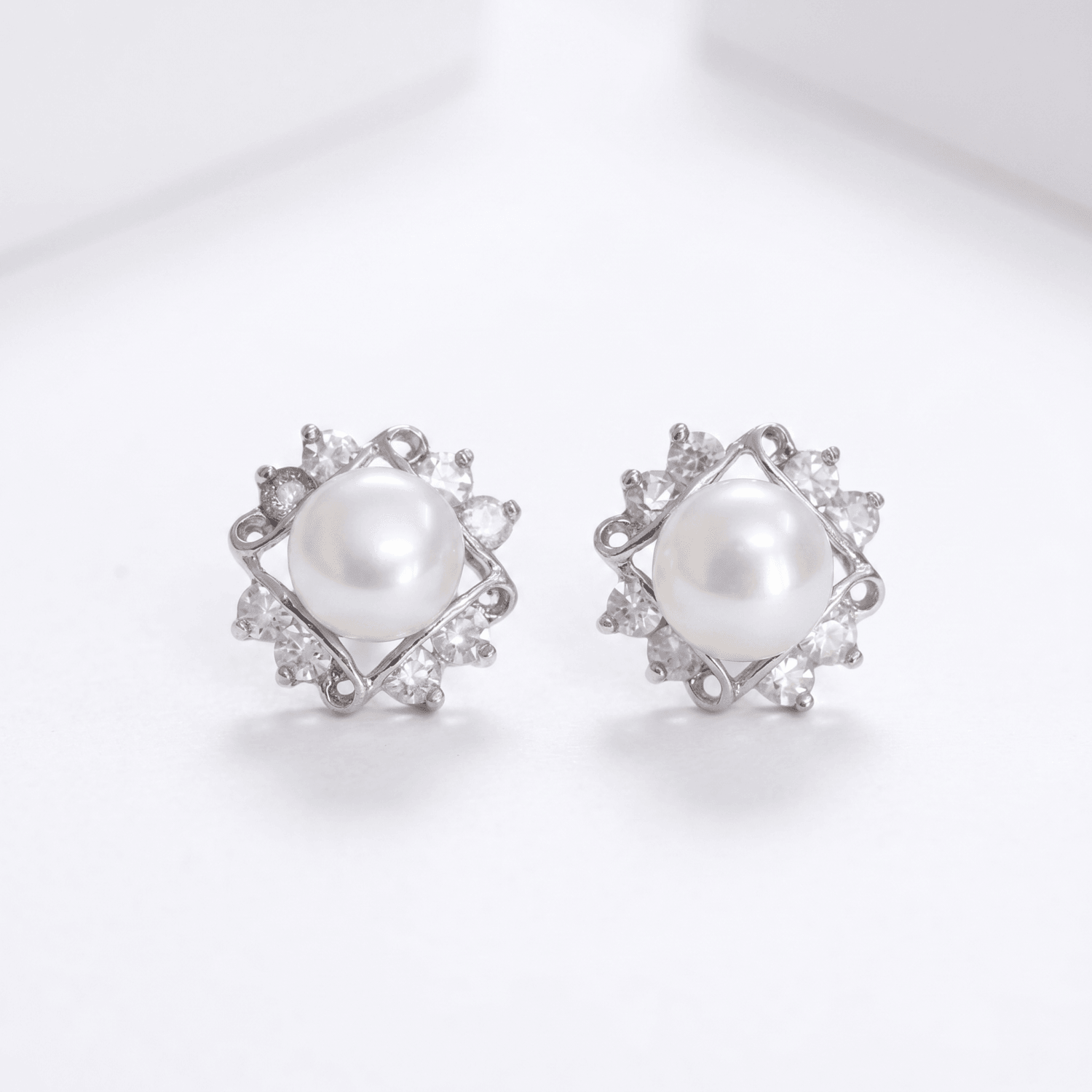 White pearl Studs with Beautiful American Diamonds