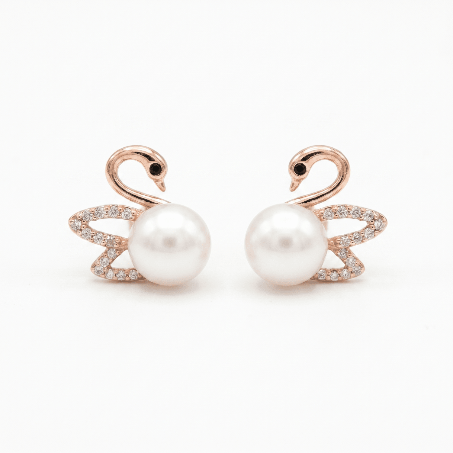Swan Shaped Pretty Pearl Studs in White Pearls and Rose Gold Metal