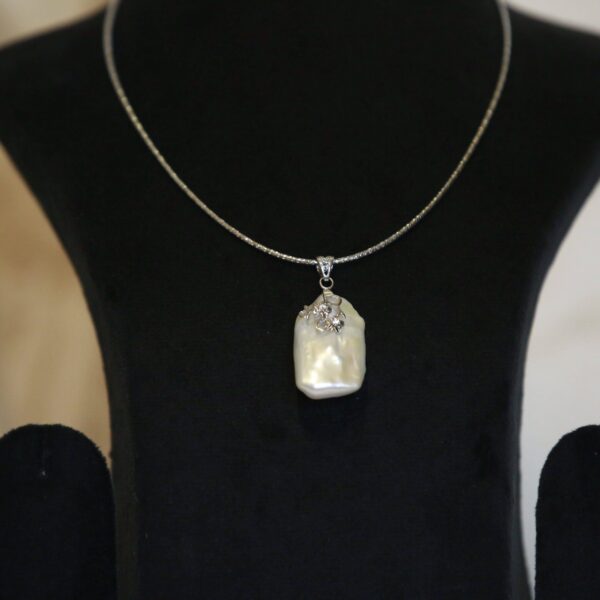 Charismatic White Baroque Pearl Pendant With CZ Floral 925 Silver Clasp