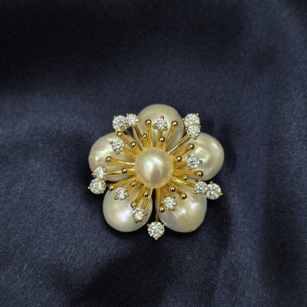 Radiant Golden Finish Floral Brooch With Coin Pearls & CZ's