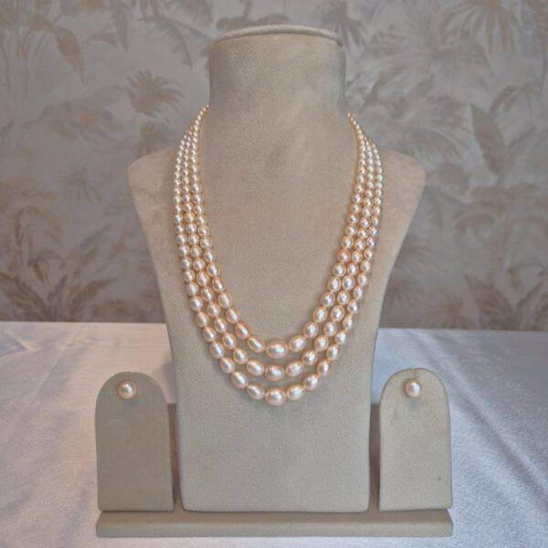 Exquisite 3Row 20Inch Long Necklace Featuring Graduated Peach Oval Pearls