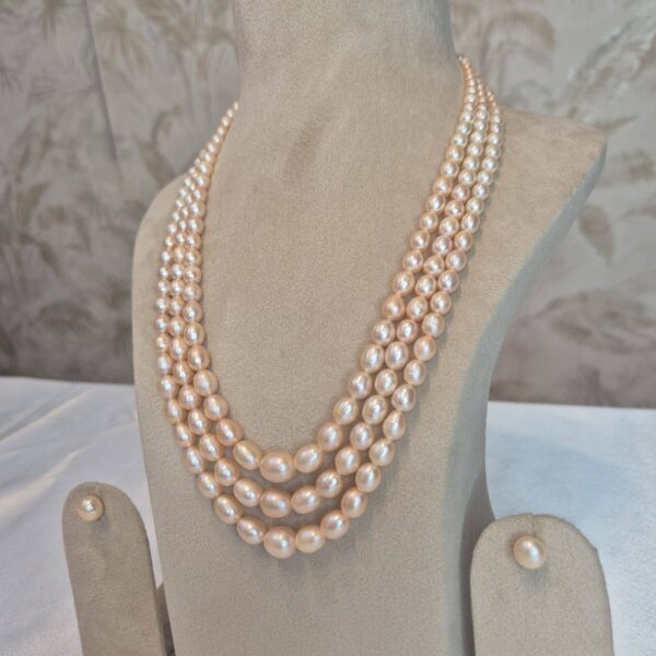 Exquisite 3Row 20Inch Long Necklace Featuring Graduated Peach Oval Pearls