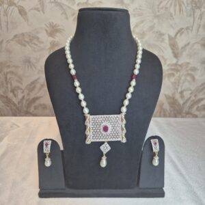 Royal White 8.5mm Oval Pearls 19Inch Long Necklace With Traditional CZ Pendant