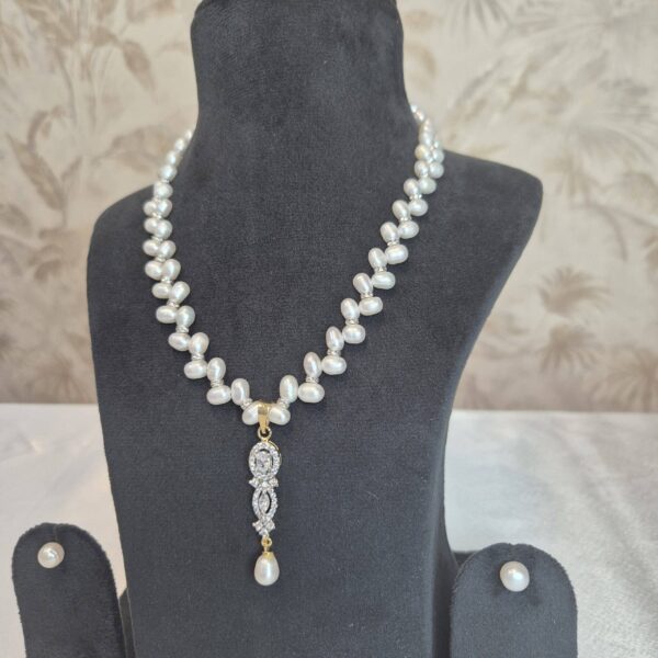 Radiant White Oval Pearl 18Inch Necklace With A Pretty CZ Pendant-1